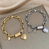 Thick bracelet with hearts | Gold
